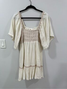 Free People Cream Babydoll dress with Bow in back